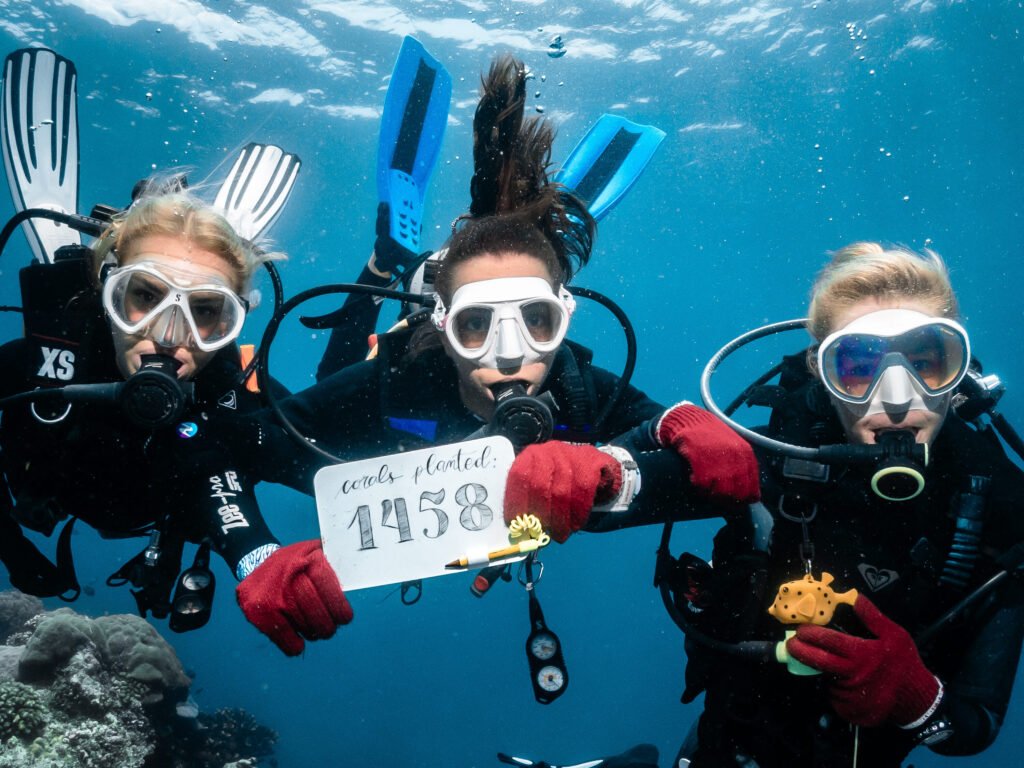 3 graduating participants of our GaiaOne Coral Restoration Course. During their 4 weeks course, they planted 1,458 corals in Indonesia