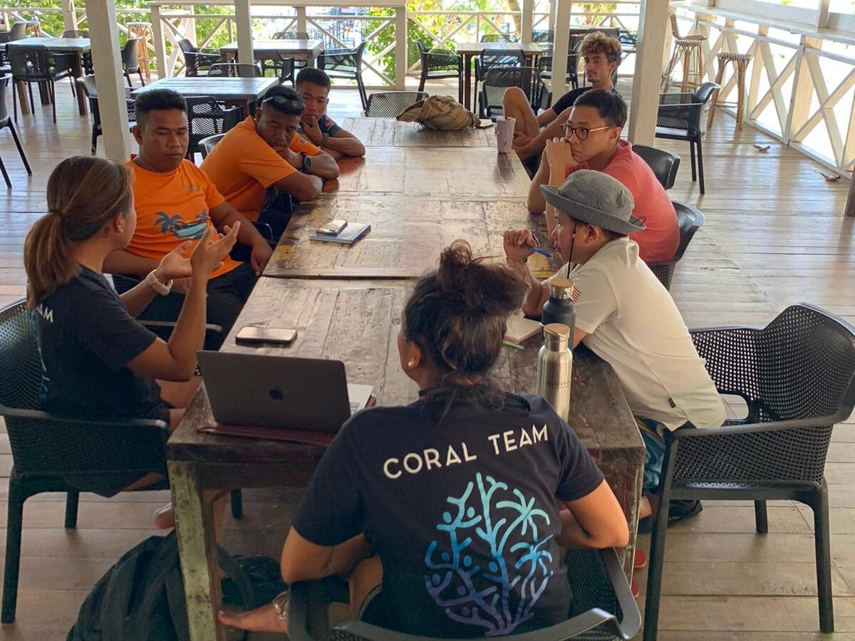 GaiaOne teaching local communities about coral conservation